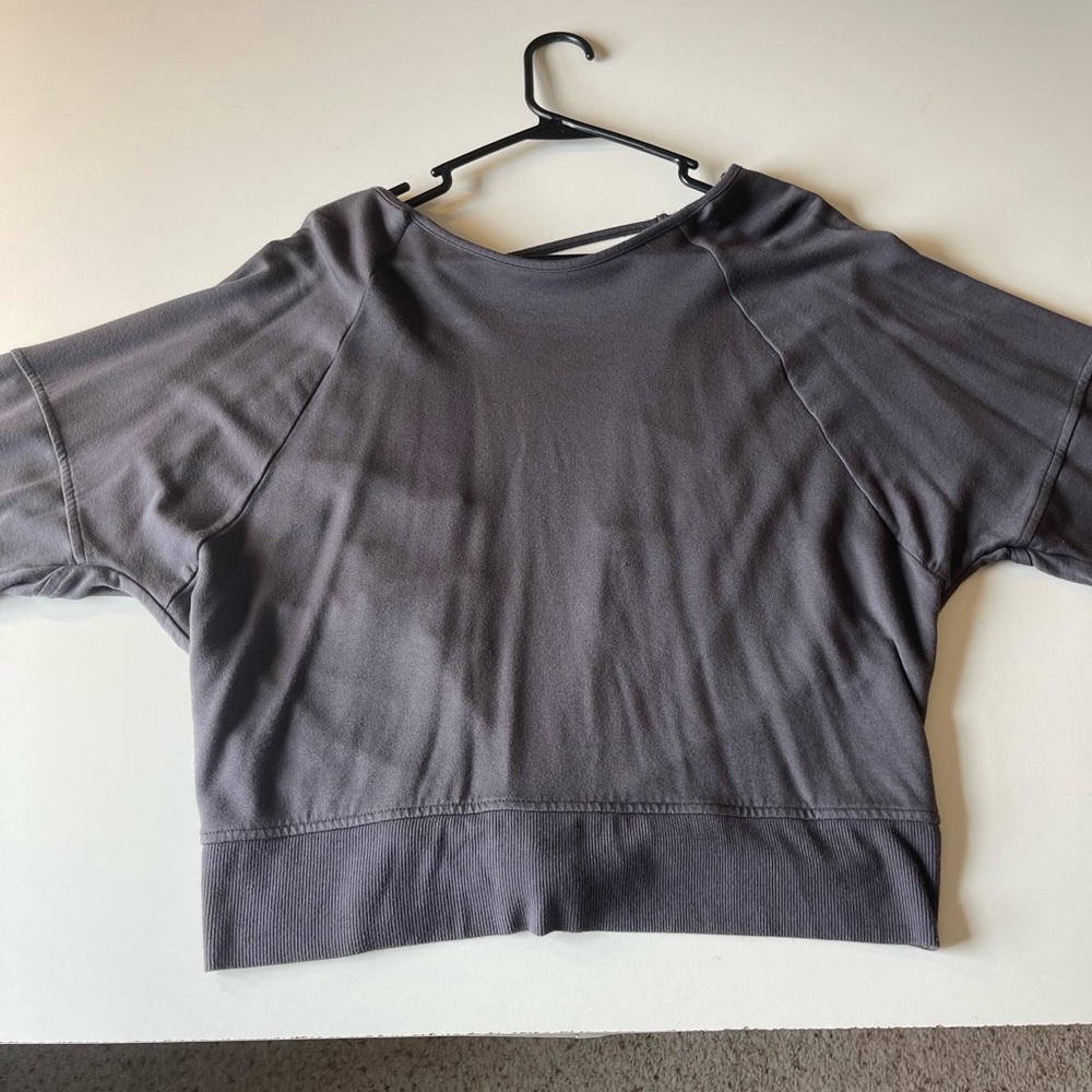 Dark gray, very soft long sleeve open back shirt.